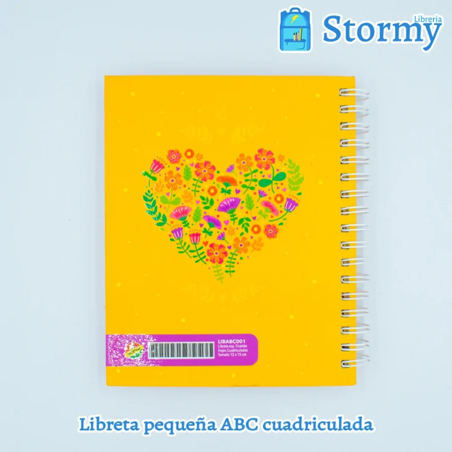 libreta_pequeña_marca_ABC_color_amarillo_con_corazon_y_flores_atras